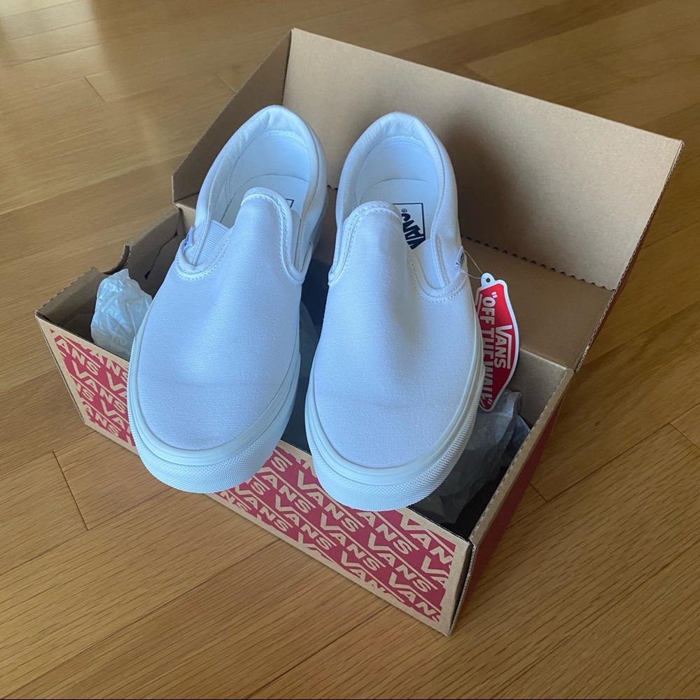 Brand new white slip on vans